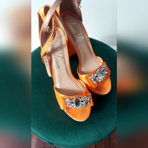 Orange rhinestone heels